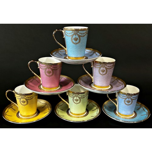 14 - A set of six bone china coffee cups and saucers in various colourways, with gilt overlay - The Royal... 