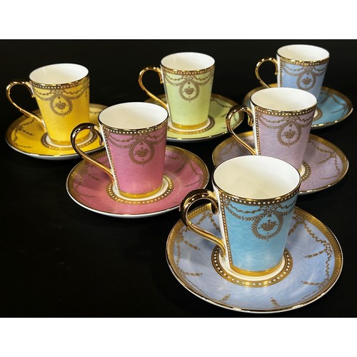 14 - A set of six bone china coffee cups and saucers in various colourways, with gilt overlay - The Royal... 