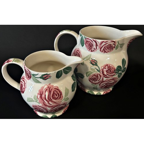 22 - Two graduated Emma Bridgewater jugs with rose detail; 6 pint example (21cm) and smaller (2)