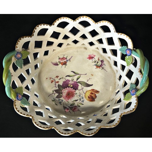 25 - A 19th century lattice work basket with hand painted floral panels