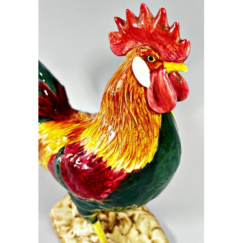 9 - A Royal Dux bull elephant, 33cm high, together with a Beswick Leghorn cockerel no 1892, 23cm high (2... 