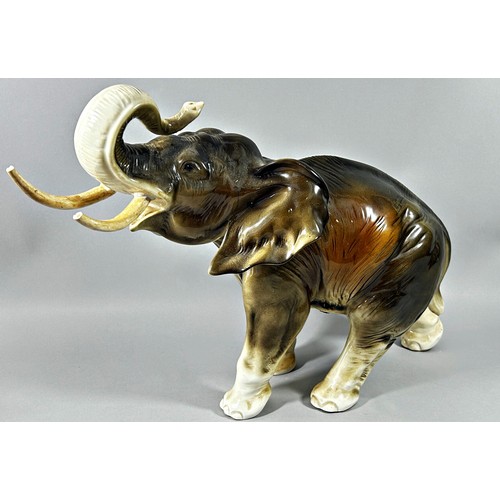 9 - A Royal Dux bull elephant, 33cm high, together with a Beswick Leghorn cockerel no 1892, 23cm high (2... 