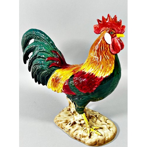 9 - A Royal Dux bull elephant, 33cm high, together with a Beswick Leghorn cockerel no 1892, 23cm high (2... 