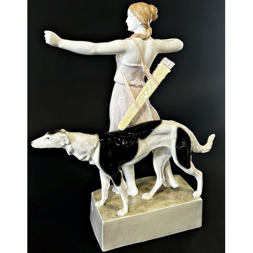 10 - A Goldschnider ceramic figure of a huntress and hound (af) 60cm tall approx