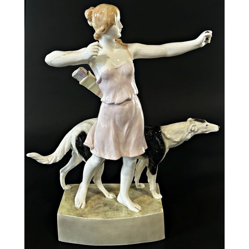 10 - A Goldschnider ceramic figure of a huntress and hound (af) 60cm tall approx