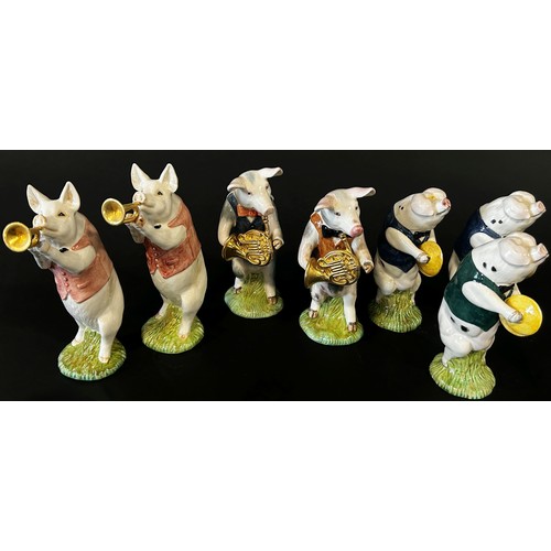 41 - A collection of Beswick Pig Promenade Band figures, some with certificates (18)