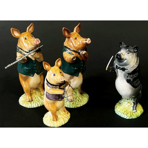 41 - A collection of Beswick Pig Promenade Band figures, some with certificates (18)