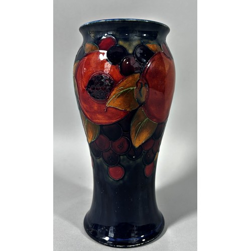 32 - A Moorcroft vase in the Pomegranate pattern, with Moorcroft signature to base, 20cm high