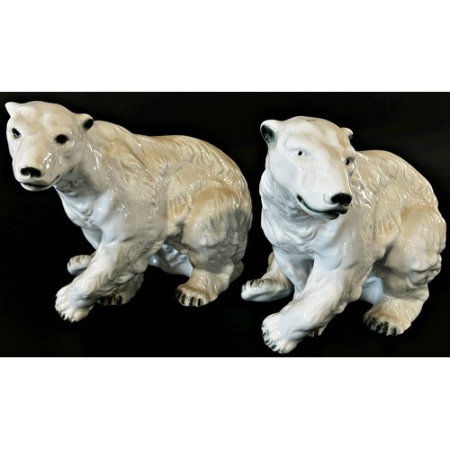 28 - Two polar bears by Royal Dux, model 398, 26cm high