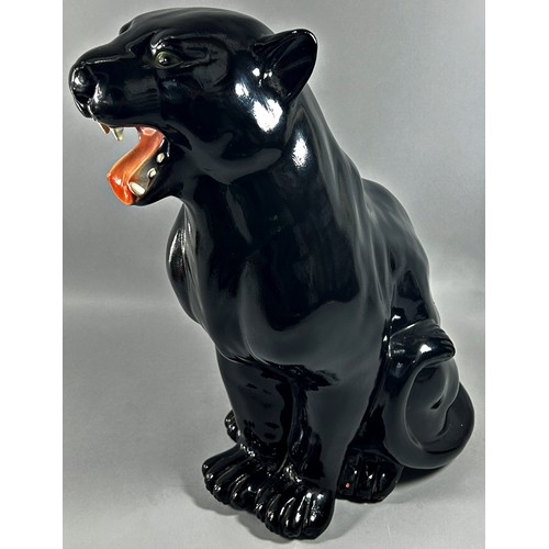 163 - Two panthers, one in a black colourway 50cm tall and a further example in green glaze, 45cm long