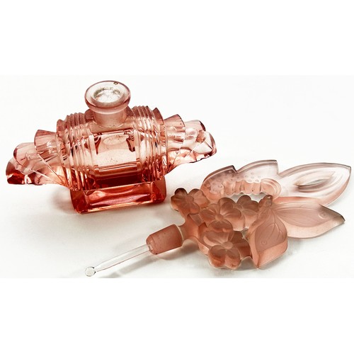 184 - An Art Deco pink glass scent bottle, with floral engraved stopper and intact dabber , 20.5cm high x ... 