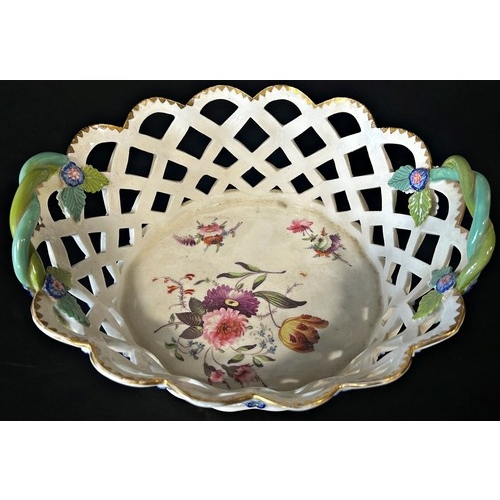 25 - A 19th century lattice work basket with hand painted floral panels