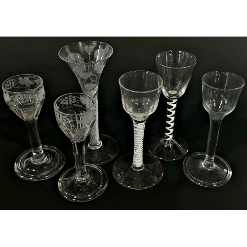 200 - Six examples of 18th century wine glasses, three with clear stems and three air blown helix spiral s... 