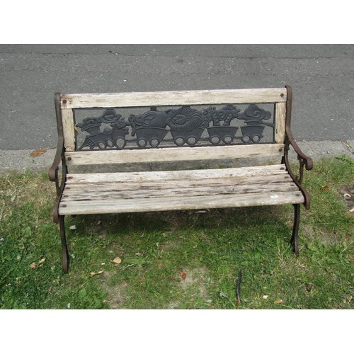 1017 - A weathered soft wood two seat garden bench with slatted seat and back, 130 cm long together with a ... 