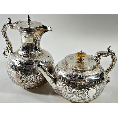 221 - An Aesthetic movement four piece silver plated tea and coffee set, with floral decoration amidst geo... 