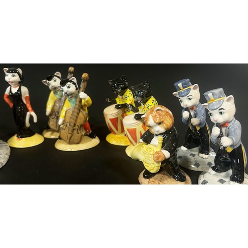 63 - A 15 piece Beswick cat band