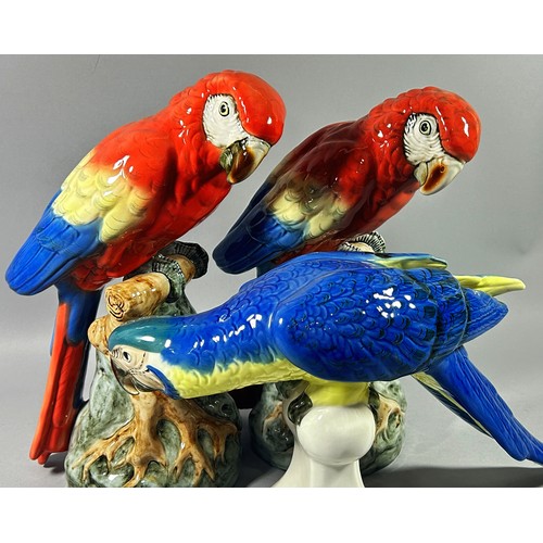 87 - Three Royal Dux figures of parrots, 32cm max (3)