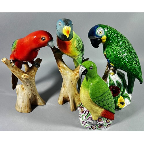 88 - A Royal Dux figure of a red parrot and three others from various continental factories, 30cm max (4)