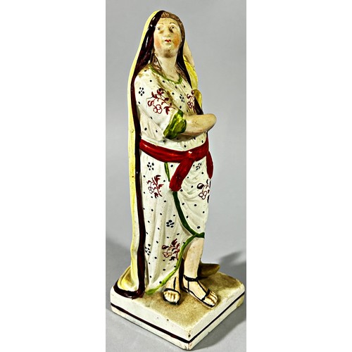 117 - 18th century Staffordshire Pearlware figure of Hope, the female figure holding an anchor, 18cm high