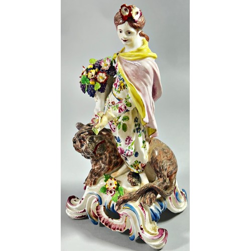 116 - An 18th century Bow porcelain figure of the Roman God Ceres, a lion at her feet, she holding a cornu... 