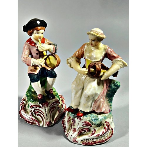 119 - A pair of 18th century Plymouth porcelain figures, male and female musicians, he playing a pipe and ... 