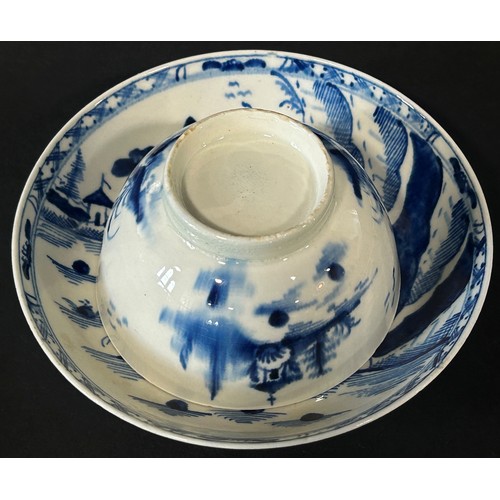 113 - An 18th century Lowestoft tea bowl and saucer with landscape detail, c.1785/90