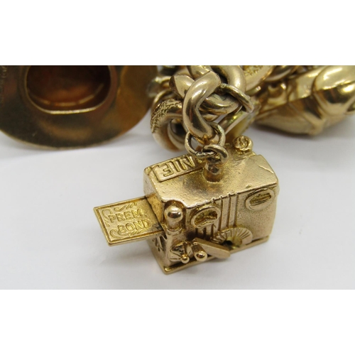 293 - Good quality 9ct charm bracelet with patent heart padlock push clasp, maker 'J.M', Birmingham, 1902,... 