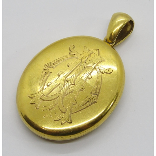 295 - Victorian 18ct locket with engraved monogram, 5cm L approx, 18.2g