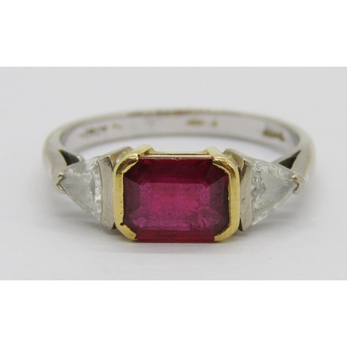 299 - 18ct bi-colour emerald-cut ruby and trillion-cut diamond three stone ring, ruby 7 x 5.5mm approx, di... 