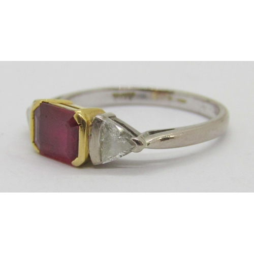 299 - 18ct bi-colour emerald-cut ruby and trillion-cut diamond three stone ring, ruby 7 x 5.5mm approx, di... 