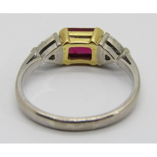 299 - 18ct bi-colour emerald-cut ruby and trillion-cut diamond three stone ring, ruby 7 x 5.5mm approx, di... 