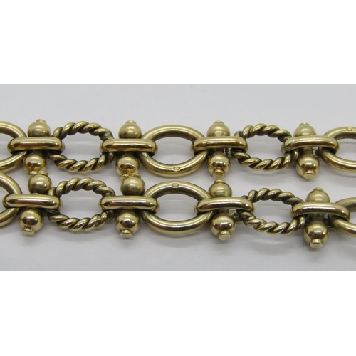 303 - 9ct fancy link bracelet with heart padlock clasp, maker 'ASJ', London 1994, 30.7g