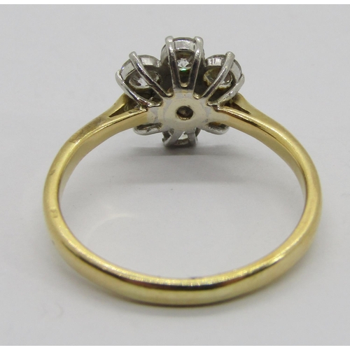 304 - Vintage yellow metal brilliant-cut diamond daisy cluster ring with white metal setting, set with sev... 