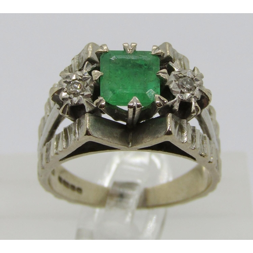 308 - Vintage 18ct white gold emerald and diamond three stone ring with raised setting, the emerald 11 x 1... 