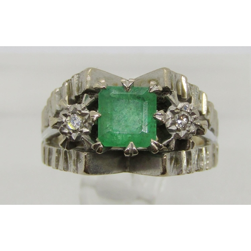 308 - Vintage 18ct white gold emerald and diamond three stone ring with raised setting, the emerald 11 x 1... 