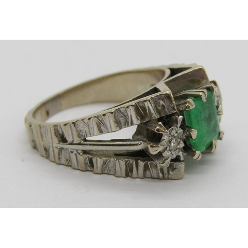 308 - Vintage 18ct white gold emerald and diamond three stone ring with raised setting, the emerald 11 x 1... 