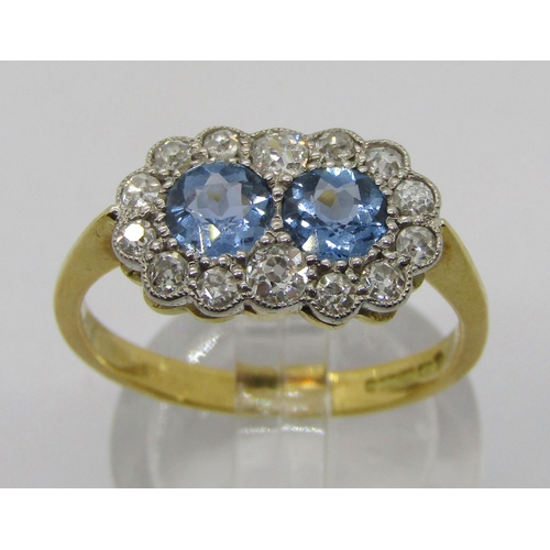 310 - 18ct sapphire and diamond twin daisy cluster ring, maker 'DOM', Birmingham, size O/P, 3g