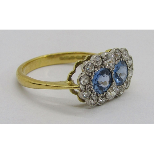 310 - 18ct sapphire and diamond twin daisy cluster ring, maker 'DOM', Birmingham, size O/P, 3g