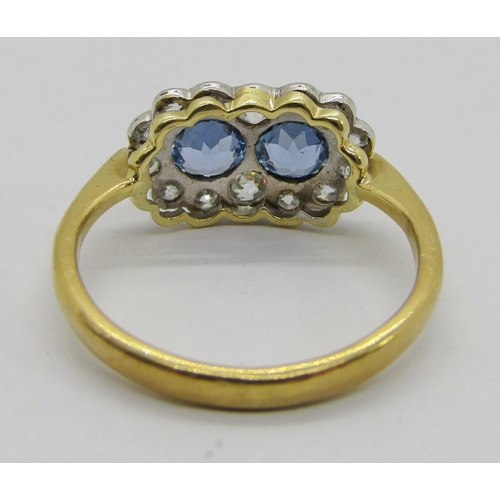 310 - 18ct sapphire and diamond twin daisy cluster ring, maker 'DOM', Birmingham, size O/P, 3g