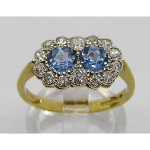 310 - 18ct sapphire and diamond twin daisy cluster ring, maker 'DOM', Birmingham, size O/P, 3g