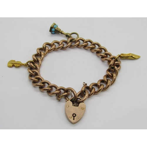 316 - 9ct curb link bracelet with heart padlock clasp, hung with a 9ct slipper and cello charm and a furth... 