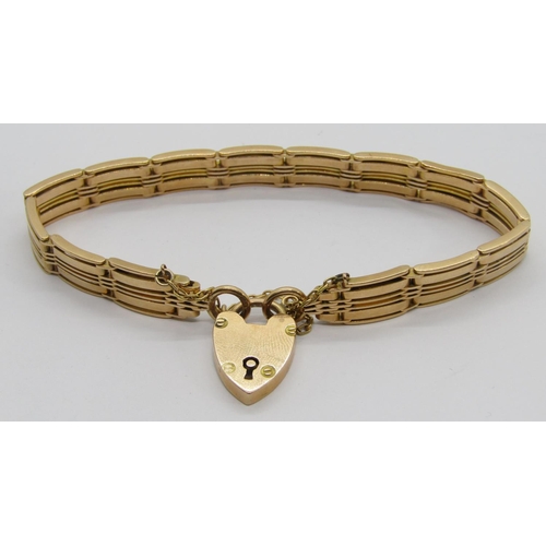 318 - Early 20th century 15ct gate link bracelet with heart padlock clasp, maker 'J.G&S', 24g