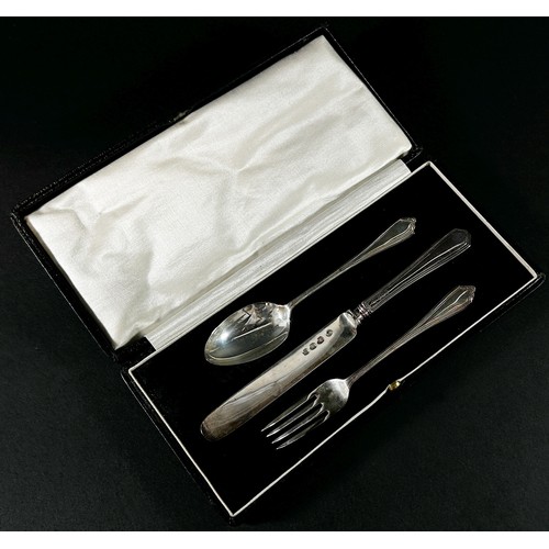 242 - A cased silver christening knife, fork and spoon set, London 1929, maker Josiah Williams 2.6 ozs all... 