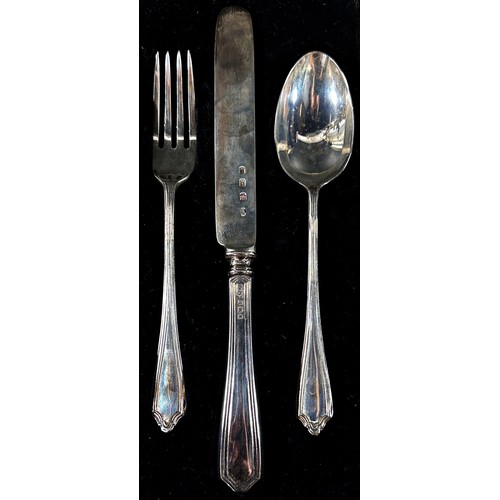 242 - A cased silver christening knife, fork and spoon set, London 1929, maker Josiah Williams 2.6 ozs all... 