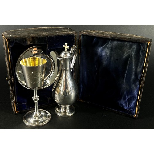 243 - A late Victorian army chaplin silver travelling communion set of ewer, chalice and paten, London 188... 