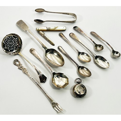 248 - A mixed selection of silver including eight varying napkin rings, eight golf teaspoons, various othe... 