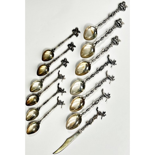 254 - Italian silver stamped 800, six teaspoons, six coffee spoons and a fruit knife, all with Venetian sy... 