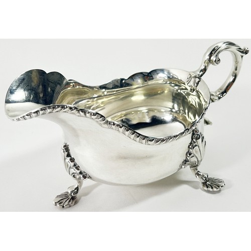 259 - A Georgian style silver gravy boat, Birmingham 1938, maker Barker Brothers Silver Ltd, 10 ozs approx... 