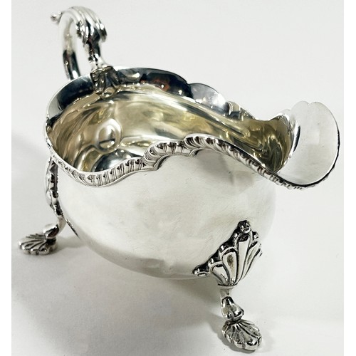 259 - A Georgian style silver gravy boat, Birmingham 1938, maker Barker Brothers Silver Ltd, 10 ozs approx... 