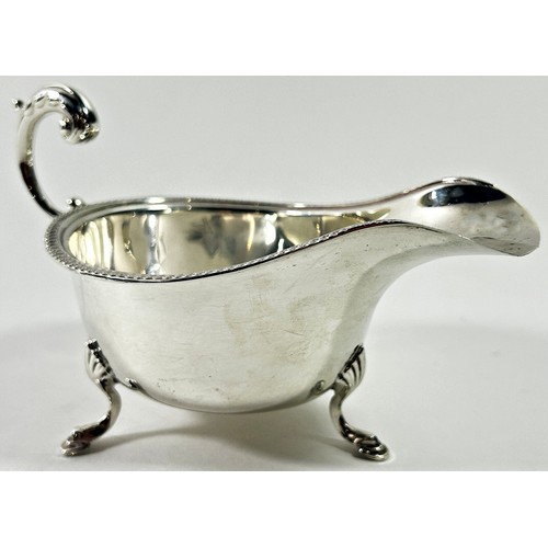 260 - A Georgian style silver gravy boat, Birmingham 1933, maker S Blanckensee & Son Ltd, 2.7 ozs approxim... 